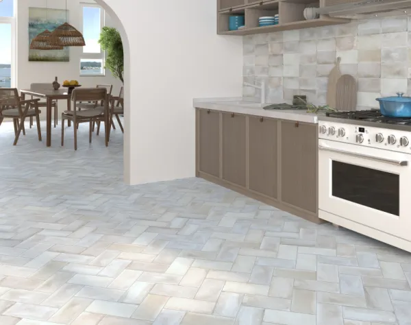 Cocina con azulejos efecto cemento en tonos neutros, colección Xabia de Dune