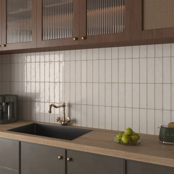 Cocina con azulejos efecto hidráulico en tonos cálidos, colección Antiga de Dune