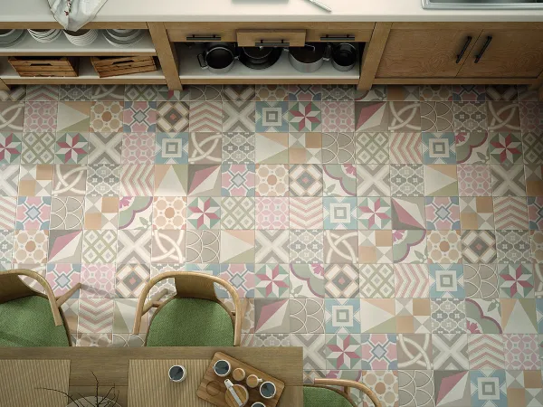 Cocina con azulejos efecto hidráulico en tonos cálidos, colección Caprice de Equipe