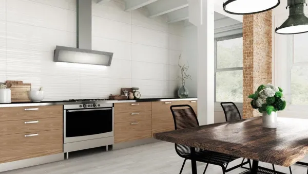 Cocina con azulejos efecto monocolor en tonos neutros, colección Bianchi de TAU ceràmica