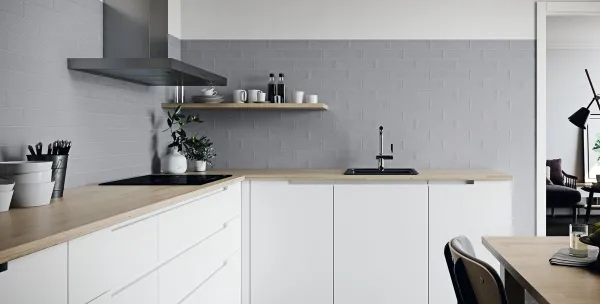 Cocina con azulejos efecto monocolor en tonos neutros, colección Mercé de Grespania
