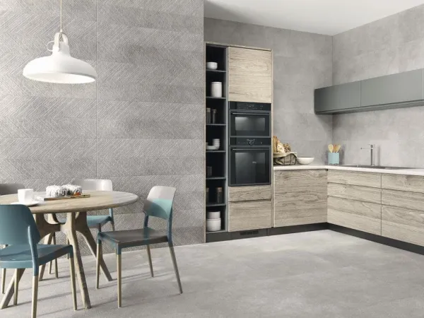 Cocina con azulejos efecto piedra en tonos neutros, colección Asphalt de Baldocer