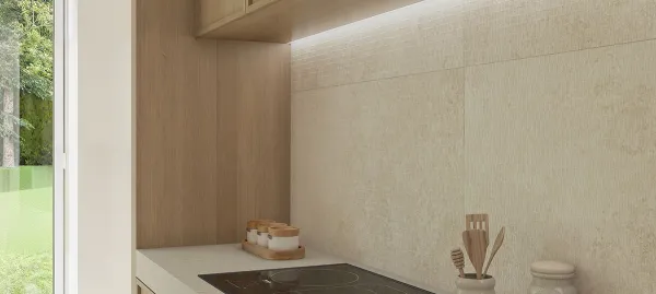 Cocina con azulejos efecto piedra en tonos cálidos, colección Petra de TAU ceràmica