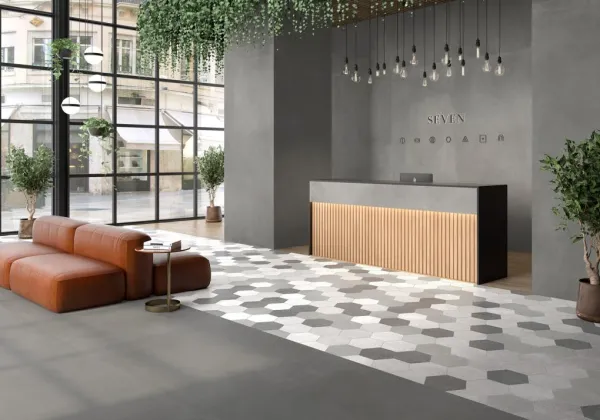 Comercio con azulejos efecto cemento en tonos neutros, colección Seven de ITT