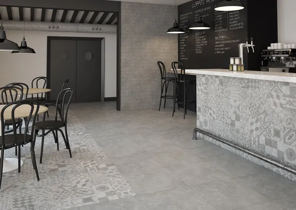 Comercio con azulejos efecto cemento en tonos neutros, colección Tanum - musson de Argenta