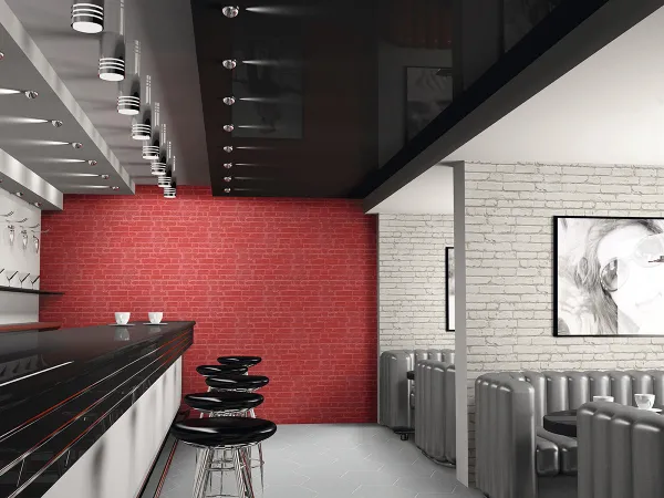 Comercio con azulejos efecto ladrillo en tonos cálidos, colección Manhattan de Realonda