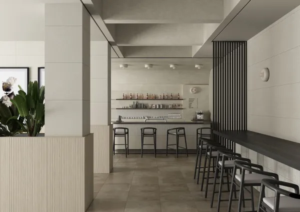 Comercio con azulejos efecto madera en tonos cálidos, colección Route de TAU ceràmica