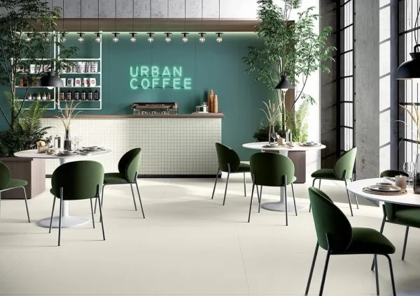 Comercio con azulejos efecto monocolor, colección Pastelli de Alfa Lux