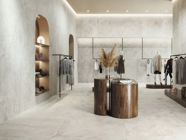 Comercio con azulejos efecto piedra en tonos neutros, colección Dome de Baldocer