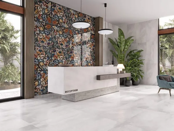 Comercio con azulejos efecto piedra en tonos neutros, colección Hydra de Fanal