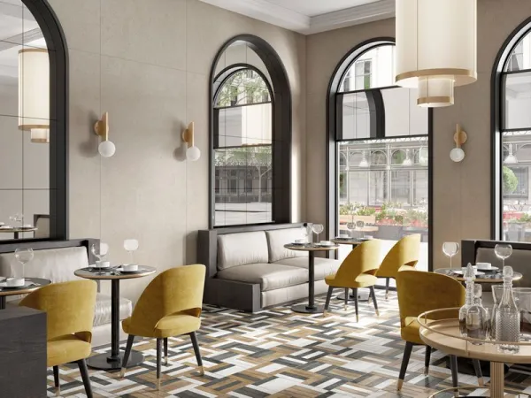 Comercio con azulejos efecto piedra en tonos cálidos, colección Somport de Durstone