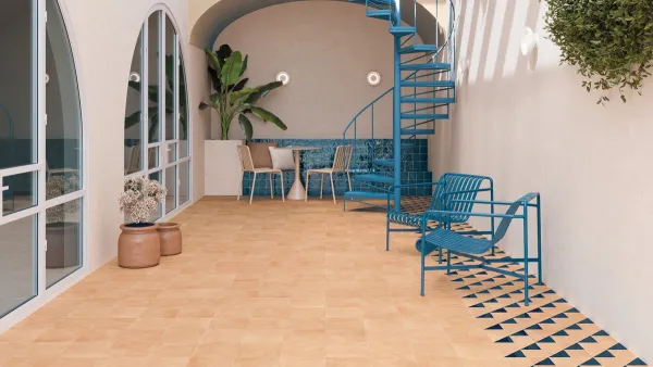 Exterior con azulejos efecto barro en tonos cálidos, colección Kora de Harmony