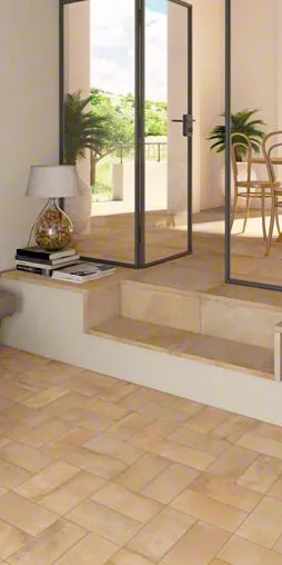 Exterior con azulejos efecto barro en tonos cálidos, colección Laverton de Vives