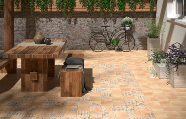 Exterior con azulejos efecto barro en tonos cálidos, colección Terracota de Dune