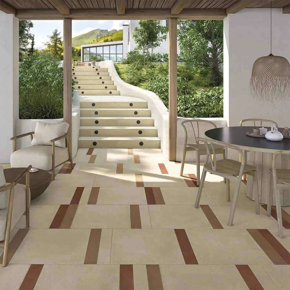 Exterior con azulejos efecto barro en tonos cálidos, colección Zero de Vives