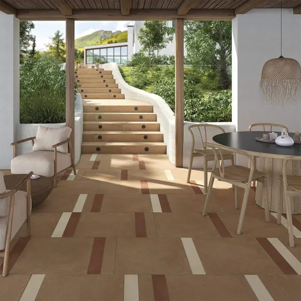 Exterior con azulejos efecto barro en tonos cálidos, colección Zero de Vives
