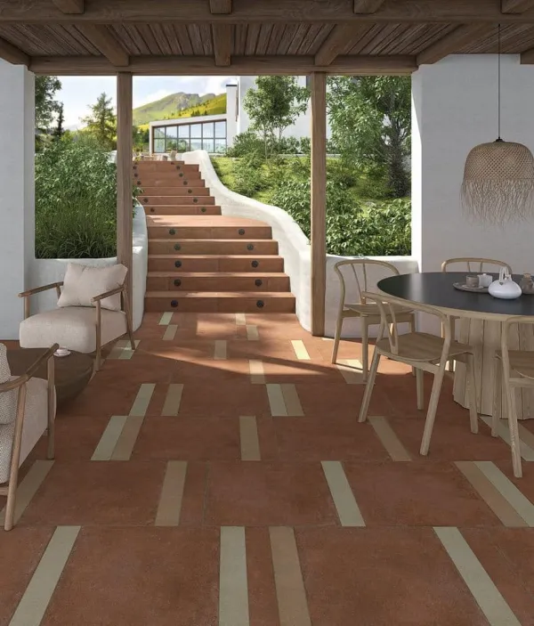 Exterior con azulejos efecto barro en tonos cálidos, colección Zero de Vives