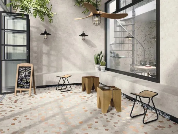 Exterior con azulejos efecto cemento, colección Ama de Ape