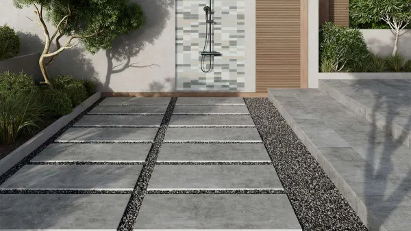 Exterior con azulejos efecto cemento en tonos neutros, colección Concrete de New Tiles