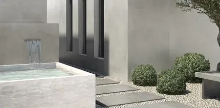 Exterior con azulejos efecto cemento en tonos neutros, colección Seven de ITT