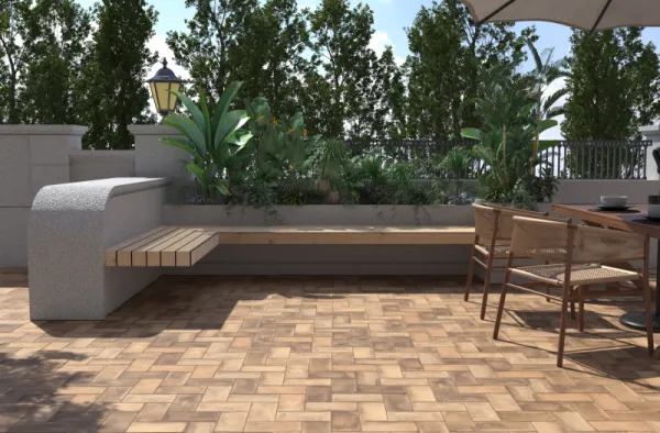 Exterior con azulejos efecto cemento en tonos cálidos, colección Xabia de Dune