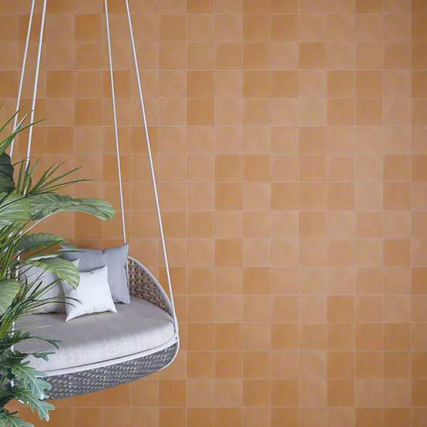 Exterior con azulejos efecto hidráulico en tonos cálidos, colección Pop tiles de Vives