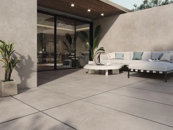 Exterior con azulejos efecto piedra, colección Asphalt de Baldocer