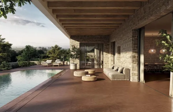 Exterior con azulejos efecto piedra en tonos cálidos, colección Essenza de Exagres