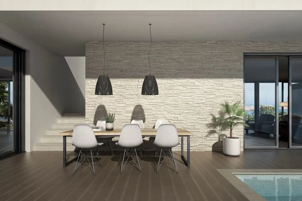 Exterior con azulejos efecto piedra, colección Nure de Emigres