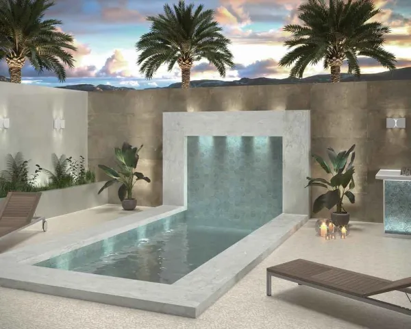 Piscina con azulejos efecto botánico en tonos fríos, colección Magnet de Dune