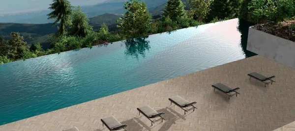 Piscina con azulejos efecto madera en tonos fríos, colección Chevron de Aparici