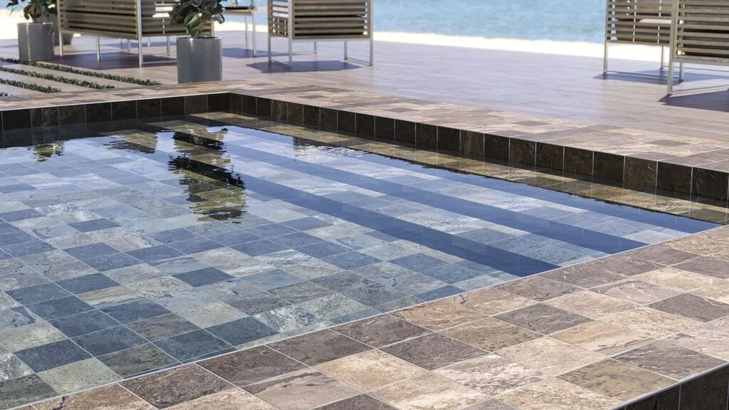 Piscina con azulejos efecto monocolor en tonos fríos, colección Bali de Equipe