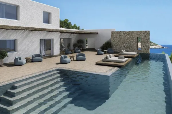 Piscina con azulejos efecto piedra en tonos fríos, colección Bedford de Exagres