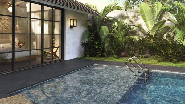 Piscina con azulejos efecto piedra en tonos fríos, colección Himalayas de Ape