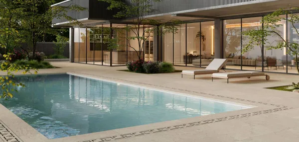 Piscina con azulejos efecto piedra, colección Provenza de Durstone
